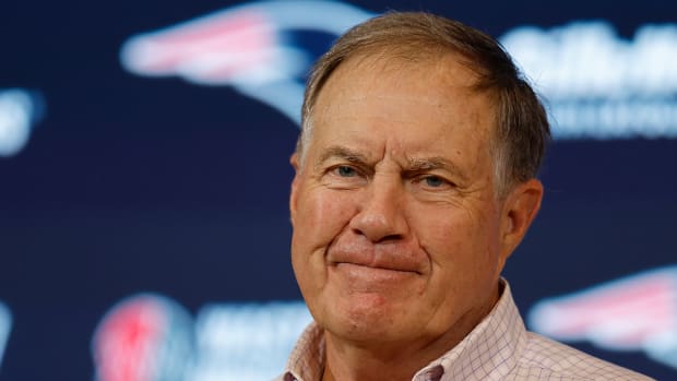 Patriots coach Bill Belichick talks with reporters following a win over the Bills.